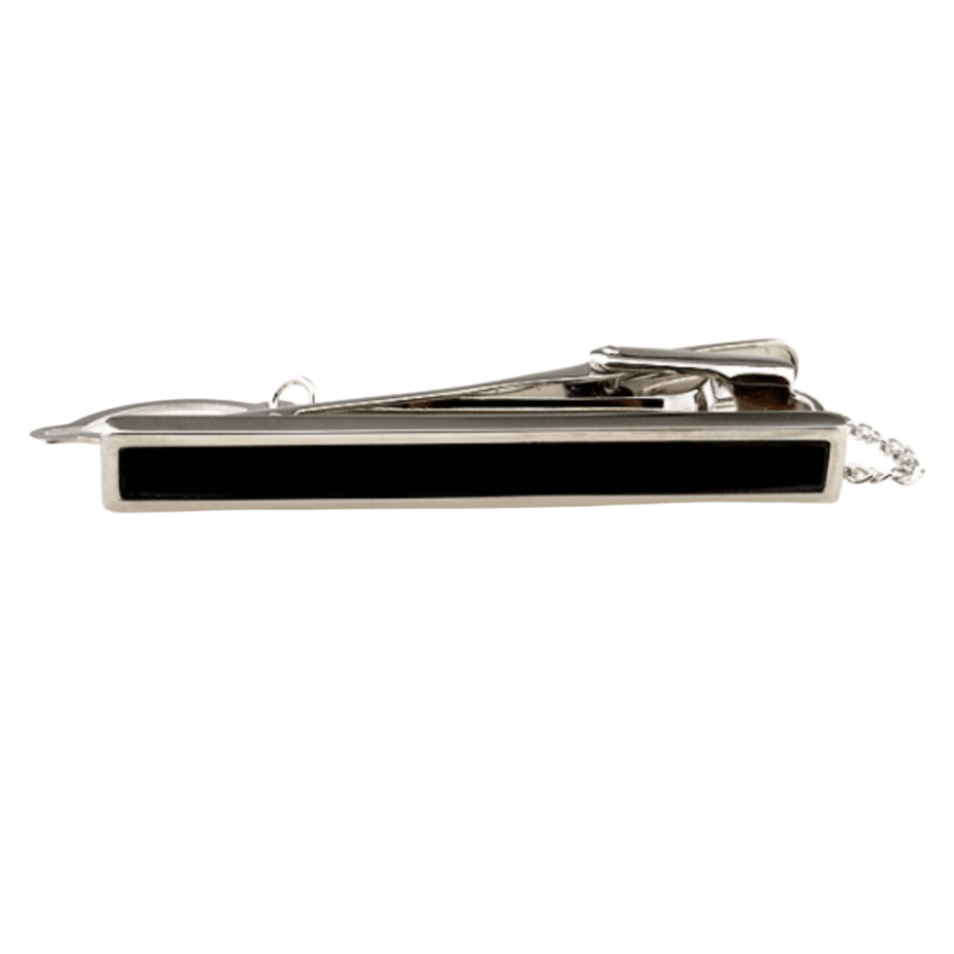 a silver tie clip with a chain and a black centre part 